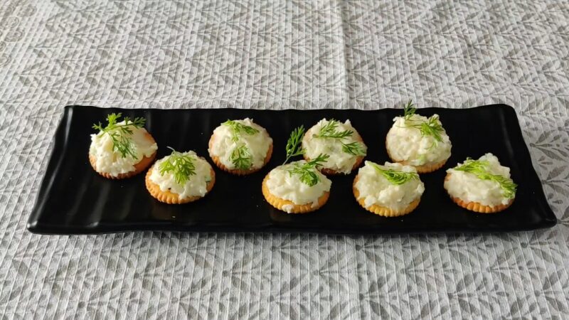 An Elegant Display of Monaco Biscuit Canapés Arranged on A Platter