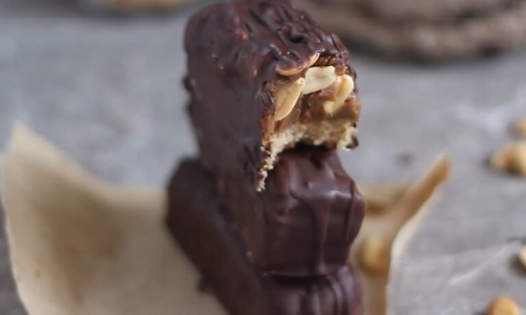 A stack of chocolate bars filled with creamy peanut butter
