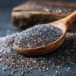 Chia seeds in a wooden spoon on a dark surface